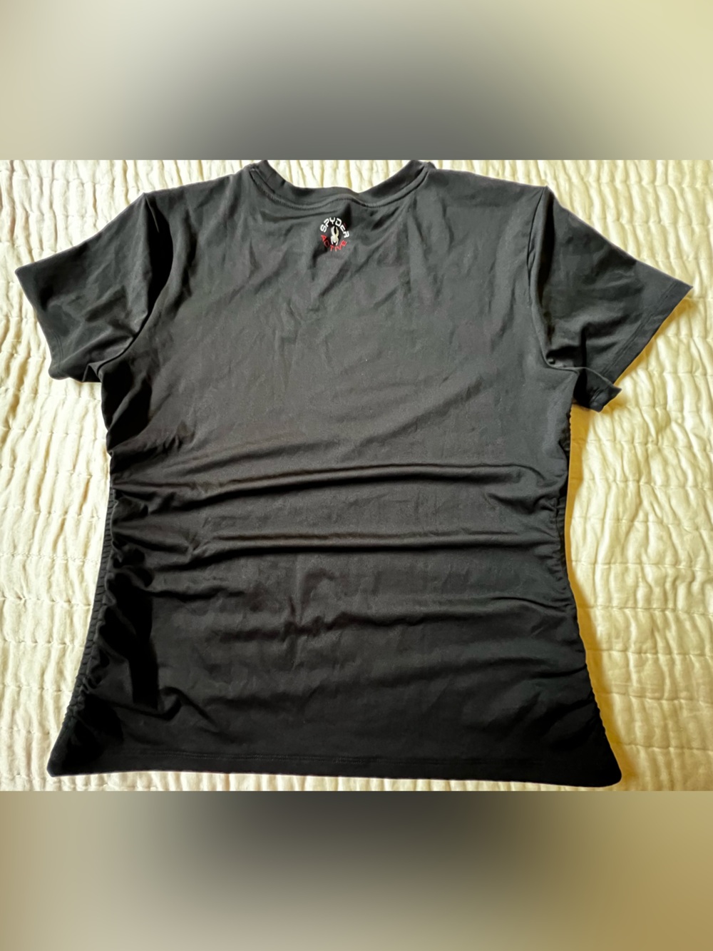 SPYDER ACTIVE WOMAN’S  RUCHED SIDES SHORT SLEEVE TOP. BLACK. SIZE LARGE